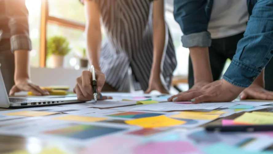 Photo of people mapping out plans