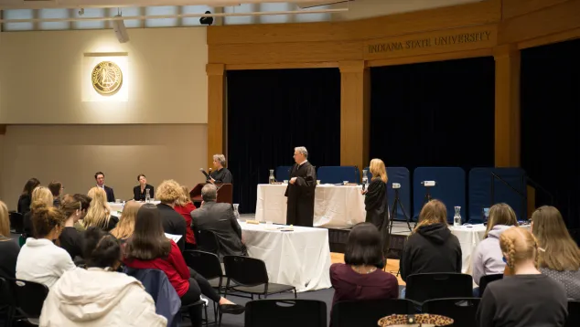 Courtroom simulation event with judges and audience