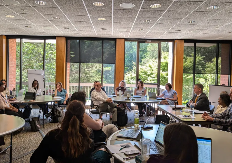 Group of people attending a meeting in conference room