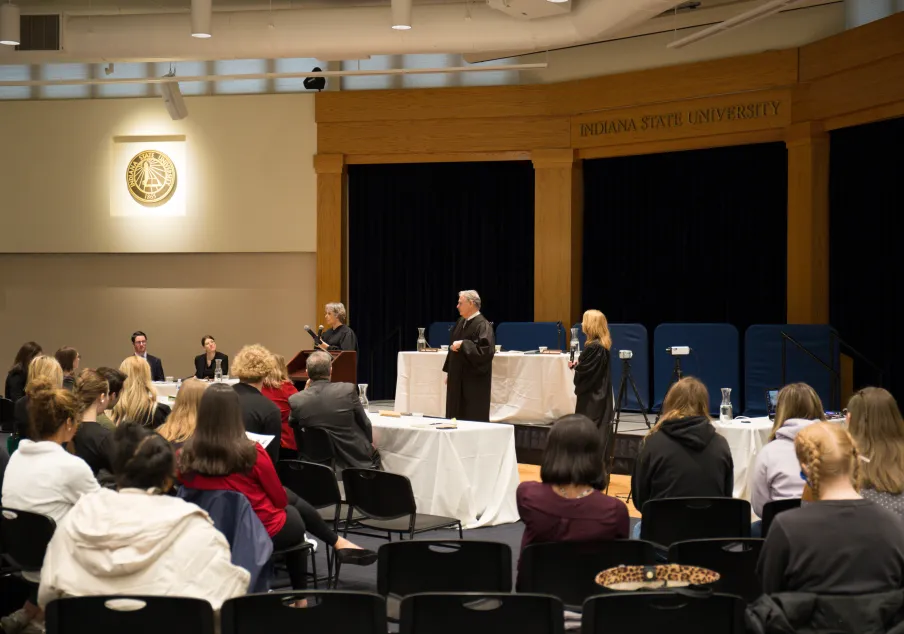 Courtroom simulation event with judges and audience