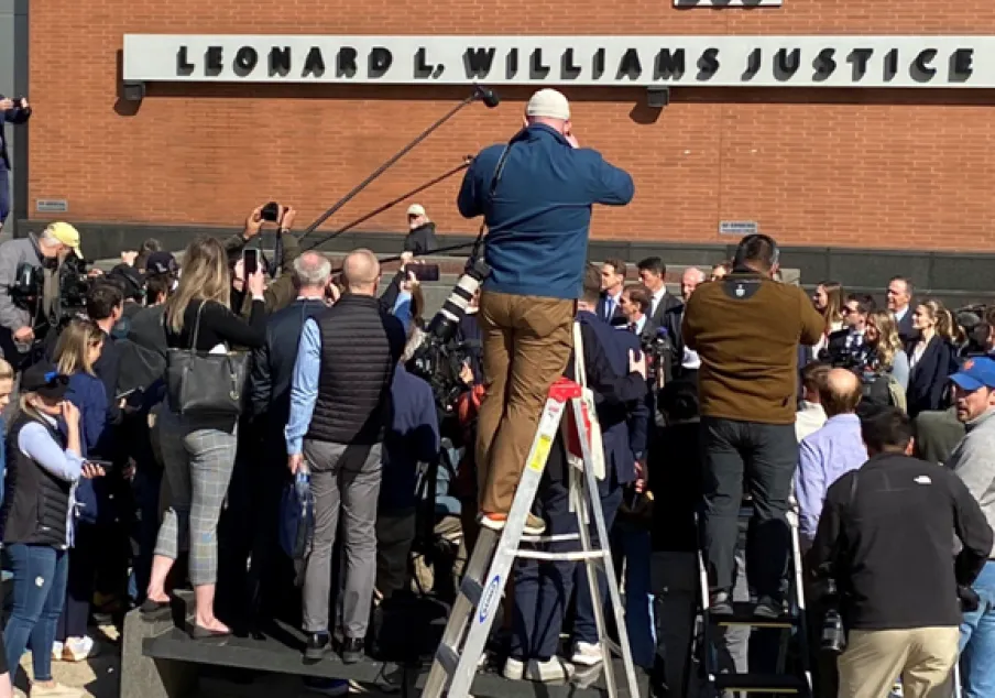 Media entourage covering high-profile case in Delaware.