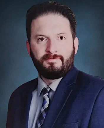Professional man in suit and patterned tie portrait