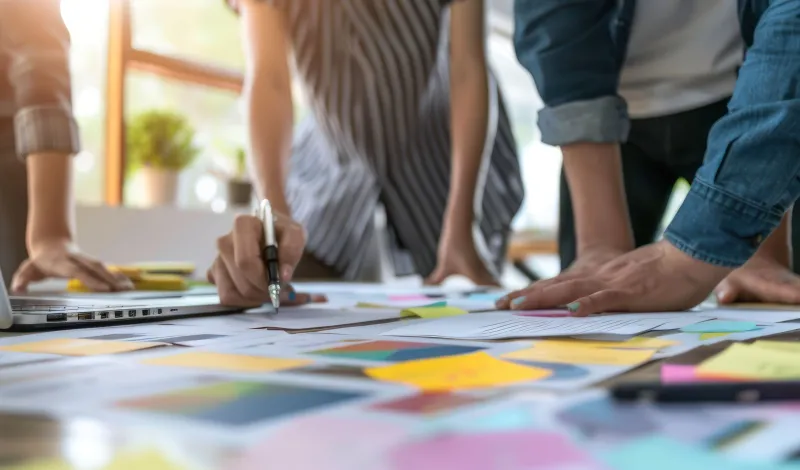 Photo of people mapping out plans